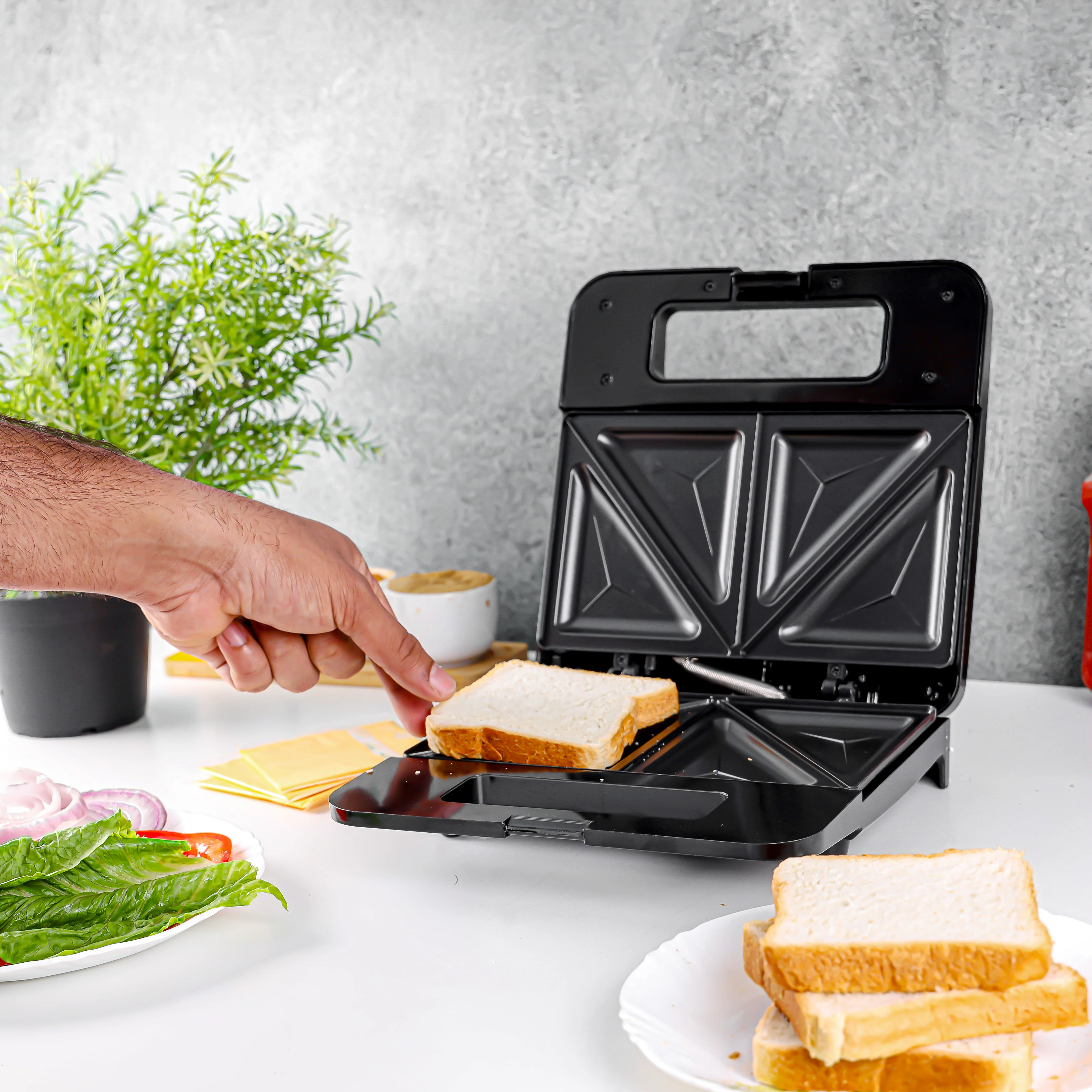 Olsenmark OMSM2404 Sandwich Maker | 750W power with non-stick plates & safety locking handle| dual indicator lights, and fast, even sandwich toasting performance| - Image 4